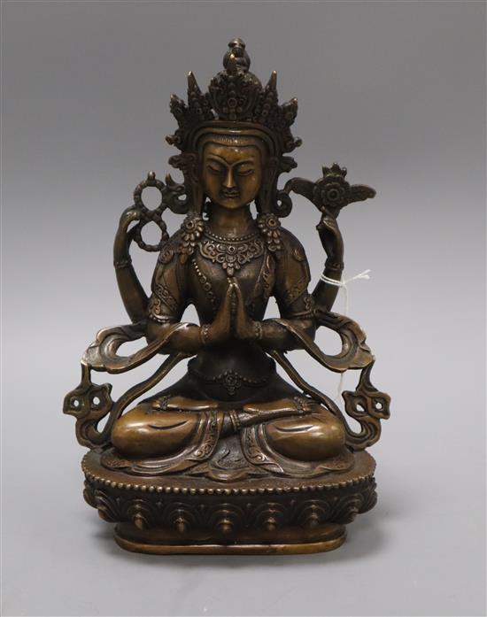 A bronze seated figure of Tara height 21.5cm